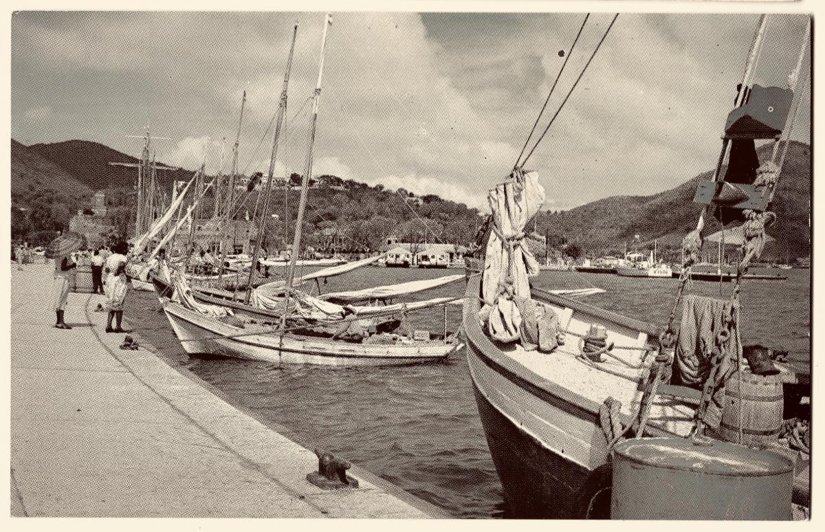 Sloops lined up at the dock historical photo