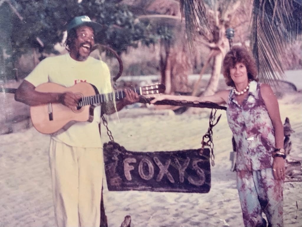 Foxy and Tessa standing by Foxy's sign